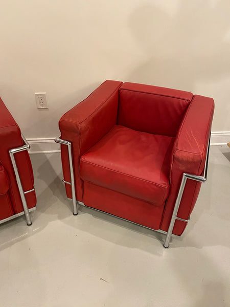 Pair of Chrome and Red Leather Club Chairs in the Style of Le Corbusier