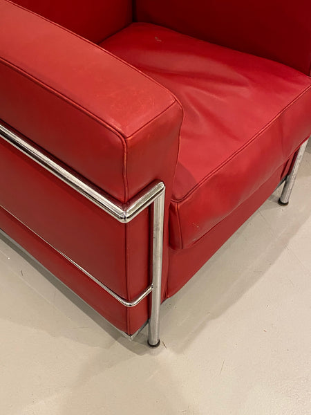 Pair of Chrome and Red Leather Club Chairs in the Style of Le Corbusier