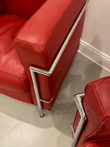 Pair of Chrome and Red Leather Club Chairs in the Style of Le Corbusier